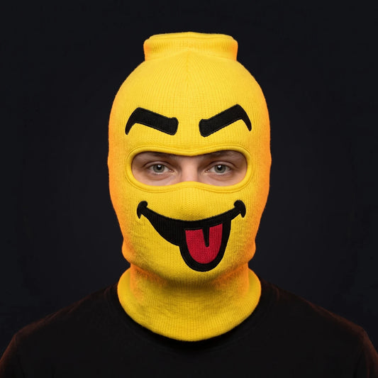 Person wearing the Blep ski mask, straight-on, real eyes visible through the open eye opening.