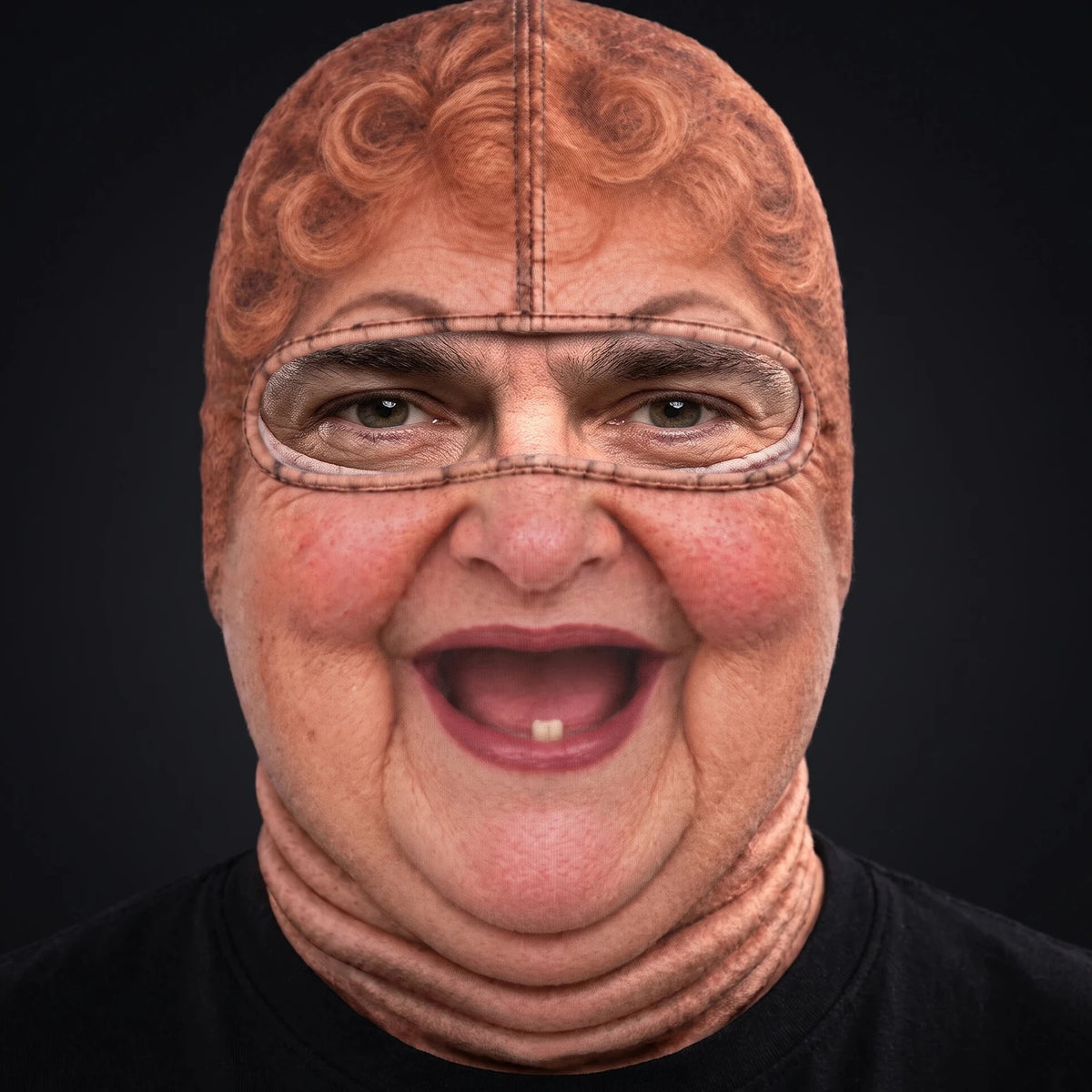 Person wearing the Aunt Bev ski mask, straight-on, real eyes visible through the open oval eye window.