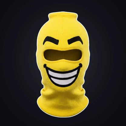 Beamer yellow block head ski mask, front view on a dark background.