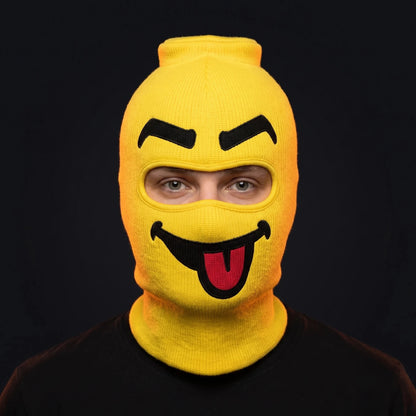 Person wearing the Blep ski mask, straight-on, real eyes visible through the open eye opening.