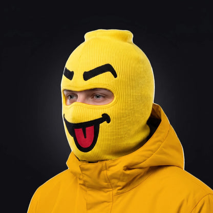 Three-quarter view of the Blep ski mask pulled over the head, ears and neck, worn with a Goon Yellow jacket.