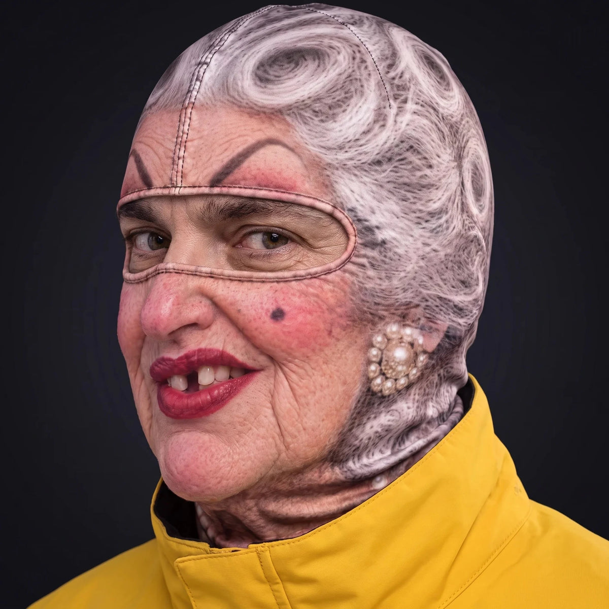 Three-quarter view of the Granny ski mask pulled over the head, ears and neck.